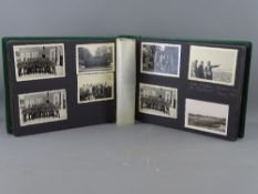 An interesting German photograph album - pre & WWII showing uniformed men and group gatherings,