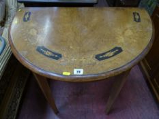 An inlaid walnut side table