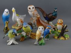 A collection of Beswick & other bird figurines