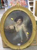 Gilt oval framed print AFTER THE ORIGINAL young boy with rabbit