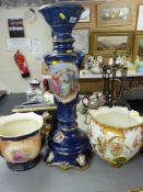 A blue pottery jardiniere & stand with a further floral decorated jardiniere