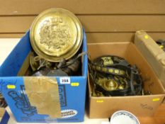 A collection of brassware, horse brasses, bridle straps, brass inkwell etc