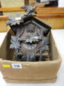 A cuckoo clock with weights