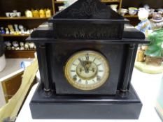 A fine pillared and steeple topped slate mantle clock