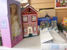 A boxed Barbie doll, a boxed Leonardo doll entitled 'Gabrielle', two musical / light up Christmas