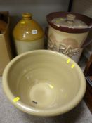 A stoneware crock, flagon marked A.N.C.S.L 2gal and a Welsh bread bin