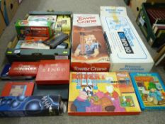 A boxed metal detector, a boxed Casdon tower crane, a quantity of vintage & other table & board