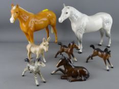 A collection of Beswick horses & a donkey (some damages)