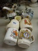 Four royal commemorative mugs & five small pottery jugs & vases (non-commemorative)