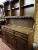 An oak Priory-style dresser