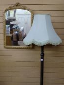 A vintage standard lamp & shade together with a gilt framed wall mirror