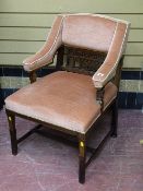 Pink upholstered armchair on tapered supports