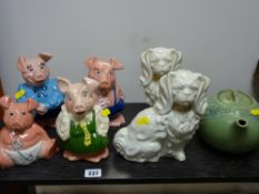 Set of four Nat West Wade pigs, pair of Staffs dogs and a vintage teapot