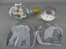 Parcel of paperweights and a ship in a bottle