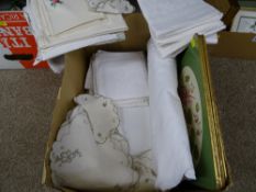 A box of vintage table linen, placemats, etc