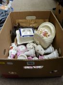 Box of mixed porcelain, twist treen candleholders etc