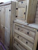 Mexican pine style bedroom suite of double wardrobe, four drawer chest and bedside cabinet
