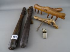 Two vintage constabulary truncheons, an Acme Thunderer whistle, treen rake and a corkscrew