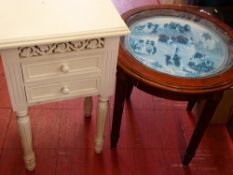 Circular occasional table on reeded supports with central picture of sheepdogs and tractor and a