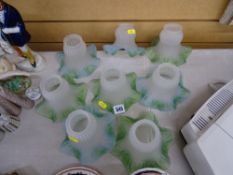 Eight vintage vaseline type glass lampshades