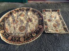 Large circular floral rug 180cms diam.and one other smaller rectangular rug 130 x 77cms