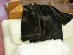 Vintage fur coat, sheepskin rug etc