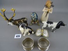 Pair of silver napkin rings, ornamental Faberge style egg, Willow Tree ornament, metallic ornamental