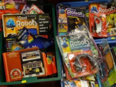 Three tubs containing a large quantity of 'The Ultimate Real Robot' magazine. accessories etc and