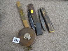 Two vintage cased razors, vintage tape measure and a level