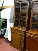 Antique bookcase cupboard with single upper glazed door, central drawer and single base cupboard