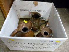 Three vintage copper measuring jugs