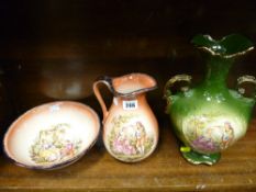 Neat jug and basin set and a similarly painted twin handled vase