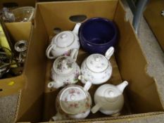 A quantity of Staffordshire teapots, etc