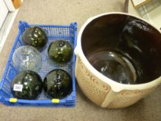Five glass floats and a large porcelain planter