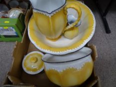 A Staffordshire canary yellow coloured wash basin set