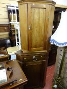 Polished wood corner hanging cupboard and another base corner unit with single drawer over a