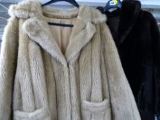 Two vintage fur coats