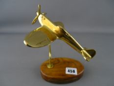 Brass ornamental Spitfire on a wooden plinth with plaque 'Never Was So Much Owed By So Many To So