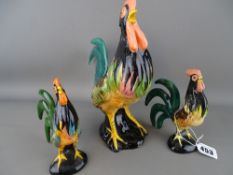Three ornamental porcelain cockerels