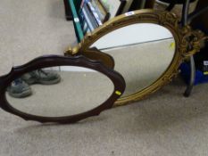 Two decorative wall mirrors