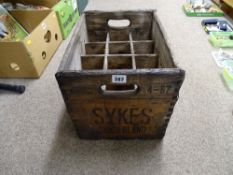 A vintage Sykes of Sunderland wooden bottle carrying box