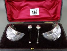 Cased set of salts with spoons