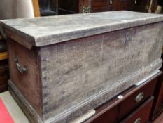 Wooden tool chest with metal handles either end