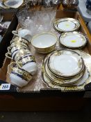 Box of Noritake teaware and etched glass pudding bowls