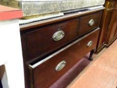 Polished wood chest of three drawers with pad feet