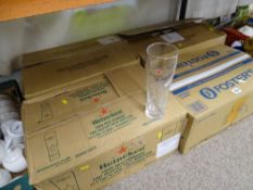 Four boxes of branded public house glasses