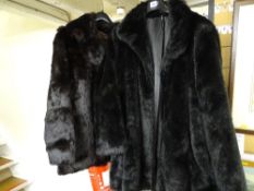 Two vintage fur coats