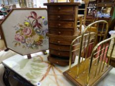 Small eight drawer chest on revolving base, a brass and wood magazine rack and small octagonal