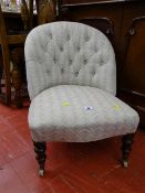 Button back classically upholstered nursing chair