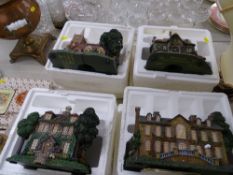 Four boxed Hawthorn Villiage Lamplight models